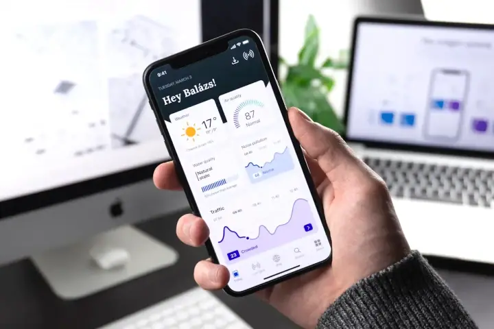Person reviewing a mobile product prototype