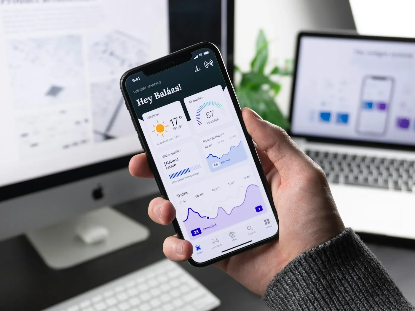 Mobile and web application interfaces on a dark display